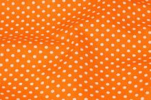 Bavlna oranžová, biele bodky, š.140
